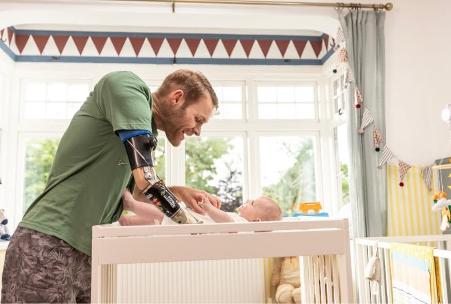 Man playing with his baby